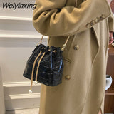 Weiyinxing Lacquer Simple Portable Bucket Bag 2023 Fashion Trend Personality Drawstring One-shoulder Messenger Women's Bag