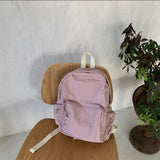 Weiyinxing Girls Korean Version Of The New Backpack Nylon Backpack Leisure Student Schoolbags 100 Cloth Bags Lovers Pure Color Trend