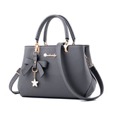 Weiyinxing Female 2024 New Lychee Grain Women's Bag Bow Middle-Aged Mother Bag Women's Handbag Can Be One Shoulder