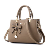 Weiyinxing Female 2024 New Lychee Grain Women's Bag Bow Middle-Aged Mother Bag Women's Handbag Can Be One Shoulder
