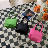 Weiyinxing Version Of Minority Ins Handbags With Nylon Handheld Simple Cube Bags Are Popular In Spring.