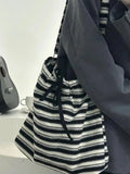 Weiyinxing 2024 Autumn New Striped Women's Fashion Drawstring Canvas Commuter Bags Korean Versatile Casual Crossbody Bag