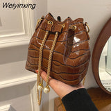 Weiyinxing Lacquer Simple Portable Bucket Bag 2023 Fashion Trend Personality Drawstring One-shoulder Messenger Women's Bag