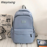 Weiyinxing New Fashion Nylon Backpack High Quality Women Book Bag Female Solid Color Big Schoolbag Teenage Girl Lovely Laptop Backpack