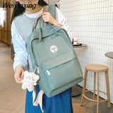 Weiyinxing Solid Color Boy College Student Schoolbag Large Capacity Canvas Washing Women Backpack Simple Fashion Teenage Girl Backpacks
