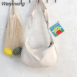 Weiyinxing style dark black solid color canvas bag women's 2023 new Korean version simple student One Shoulder Messenger Bag