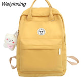 Weiyinxing Solid Color Boy College Student Schoolbag Large Capacity Canvas Washing Women Backpack Simple Fashion Teenage Girl Backpacks