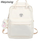 Weiyinxing Solid Color Boy College Student Schoolbag Large Capacity Canvas Washing Women Backpack Simple Fashion Teenage Girl Backpacks