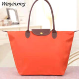 Weiyinxing capacity ladies shoulder bag Oxford cloth waterproof portable nylon shoulder bag Mommy bag