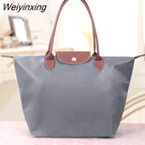 Weiyinxing capacity ladies shoulder bag Oxford cloth waterproof portable nylon shoulder bag Mommy bag