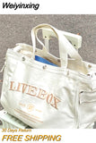 Weiyinxing Canvas Bag Women's One Shoulder Leisure Messenger Bag Students' Commuting Portable Large Capacity Bag