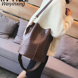 Weiyinxing Women Crossbody Bags for 2023 New Shoulder Bag Fashion Handbags and Purses Leather Stone Pattern Zipper Bucket Bags