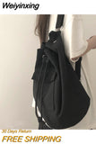 Weiyinxing ins spring 2023 with pocket canvas drawstring bucket bag inclined span single shoulder high-capacity men and women