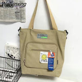 Weiyinxing Men And Women Messenger Bag Portable One Shoulder High Capacity Canvas Bag Women's Handbag School Bag Laptop Bag Ipad Bag